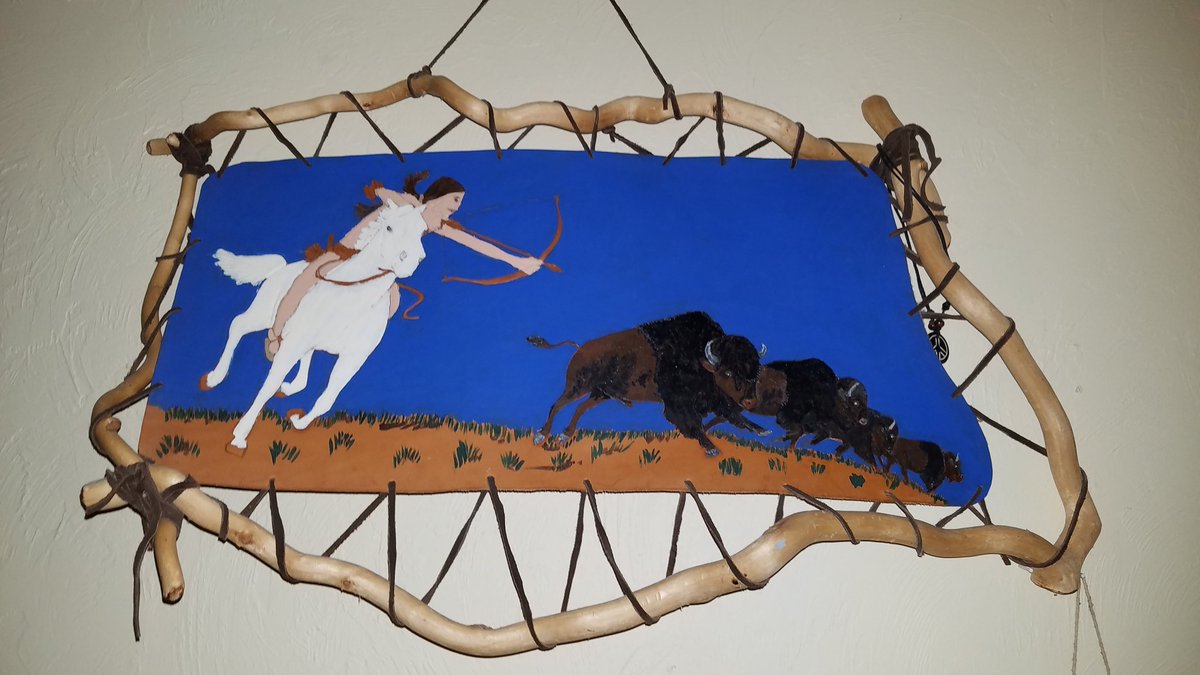 I always wanted to be Indian growing up my dna had me 43% American Indian I love leather work I tooled the leather. Y wife painted it.