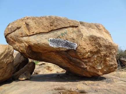 2,200-year-old Tamil-Brahmi inscription at Samanamalai , madurai, tamilnadu It is engraved on a boulder in which a drip-ledge has been cut and beds excavated on the rock floor for Jaina monks to rest ....