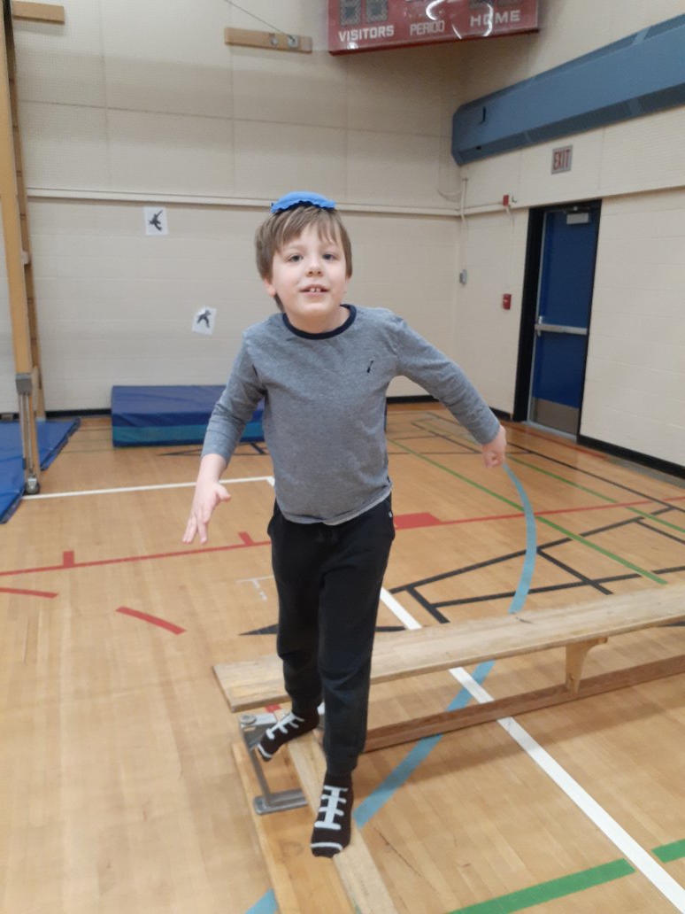 kearneysclass's tweet photo. Continuing to work on our flexibility, strength and balance in gymnastics.  Extra motivation with spy music on #wearecbe #colonelwalker https://t.co/EJD05qtrsV