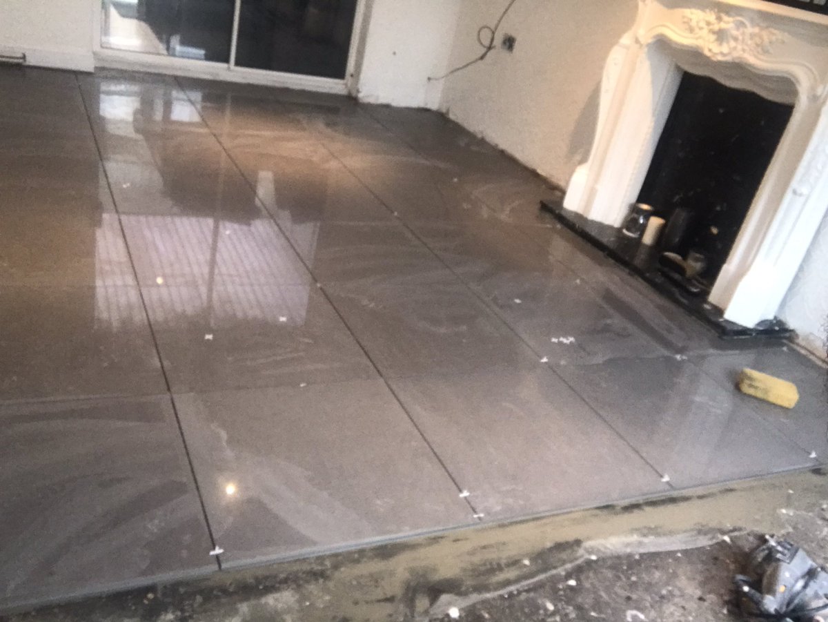 wall_pc's tweet image. Progress this morning. should be finished wednesday all polished up. 18m2 600x600 bq tiles. @toppstiles slow set grey and @larsen silver grey grout to finish up