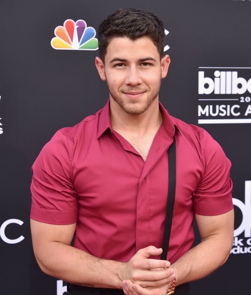 Nick Jonas in red