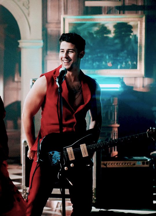 Nick Jonas in red