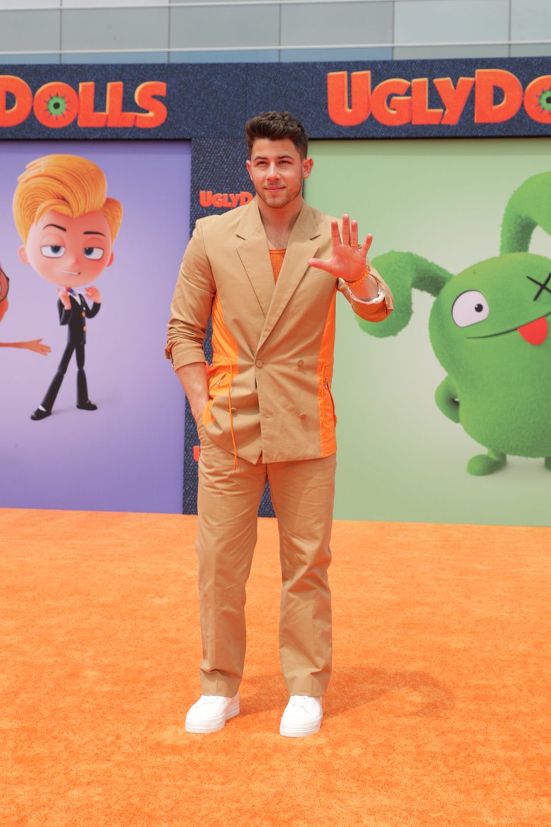 Nick Jonas in orange
