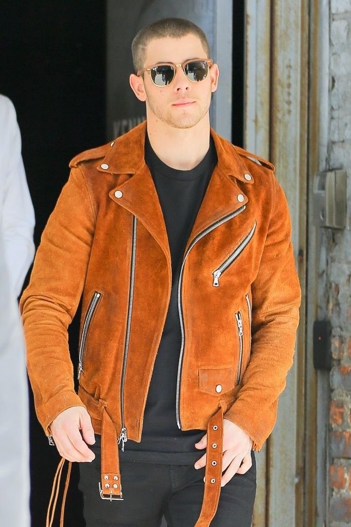 Nick Jonas in orange