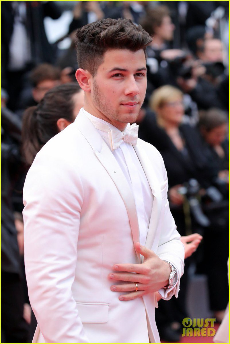 Nick Jonas in white
