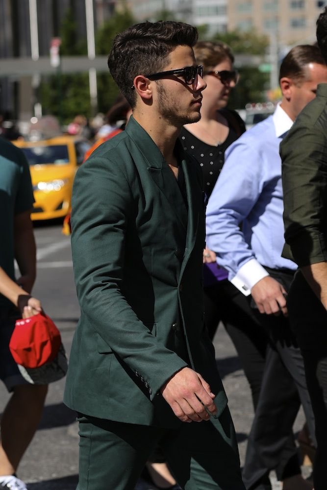 Nick Jonas in green