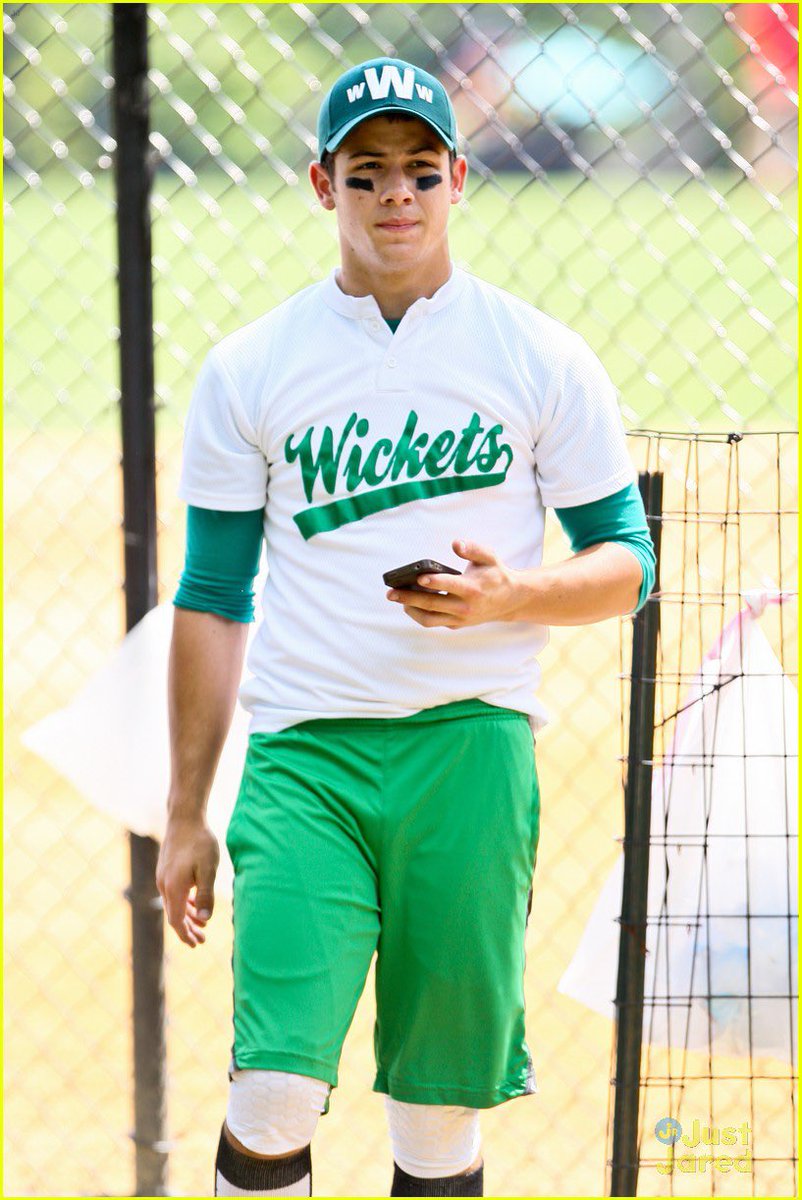 Nick Jonas in green