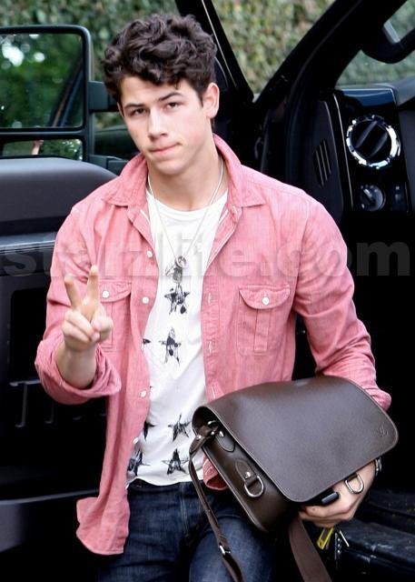 Nick Jonas in pink
