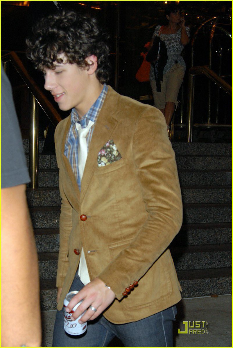Nick Jonas in brown