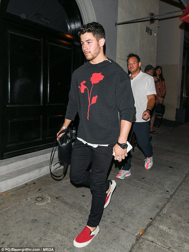 Nick Jonas in black