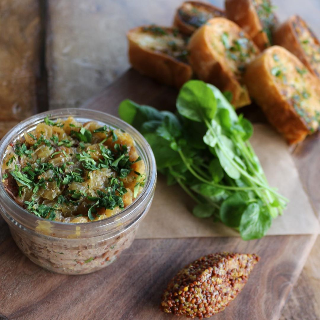 Duck Rillette with bourbon raisins served with upland cress, whole grain mustard and roasted ciabatta.🌱