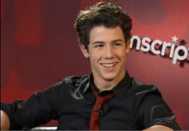 Nick Jonas smiling