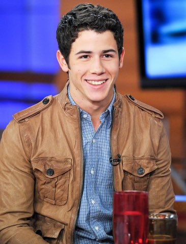 Nick Jonas smiling