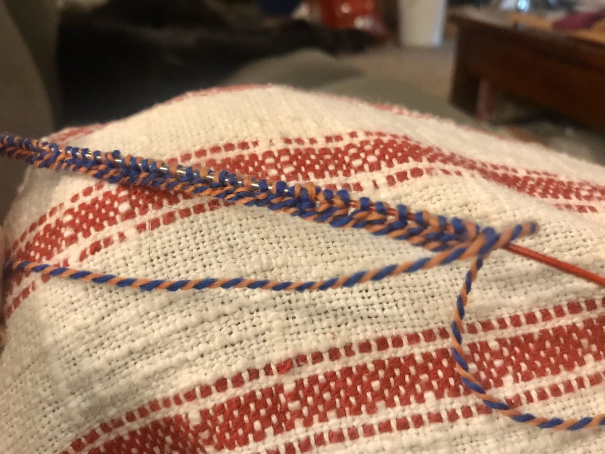 ok ok ok OKthis is not a great photograph, but I’m learning the German Twisted Cast On method, but you can’t see my cool and great progress because, like a dummy, I chose multi-colored tiny yarn for my very first project (I shall remedy this w/ more appropriate yarns later)