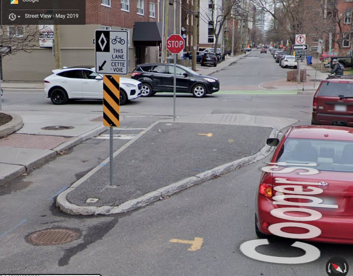 ianrausten's tweet image. A new twist, a common story. Tonight I used the bike minilane on Cooper to cross O'Connor &amp;amp; head south on its bike lanes. A RAV4 driver, however, ignored the "no thru" except bikes signs on Cooper, chopping me off. The new bit: he claimed that cyclists must walk across O'Connor!