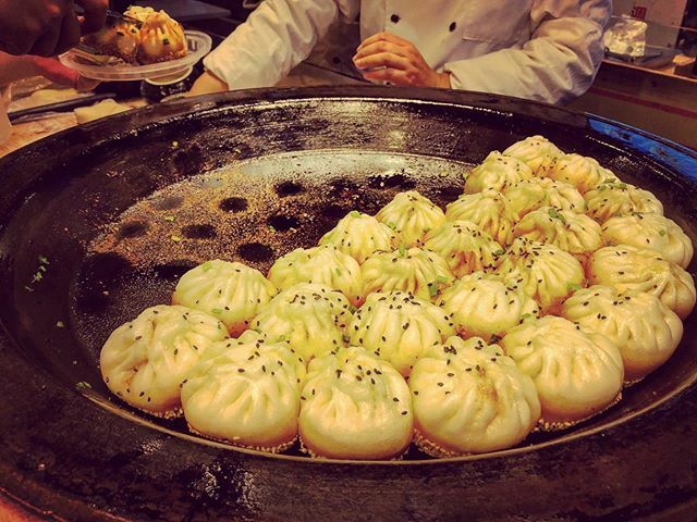 Get. In. My. Belly. Sheng Jian Bao are tasty bread buns stuffed with soup and pork, steamed, then pan fried. The way the soup is absorbed into the bread and the soft yet crispy textures... yum! 🤤