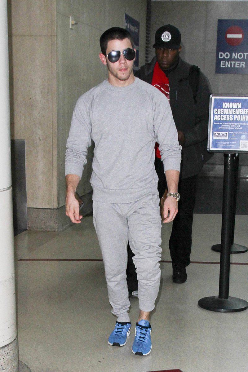 Nick Jonas in grey