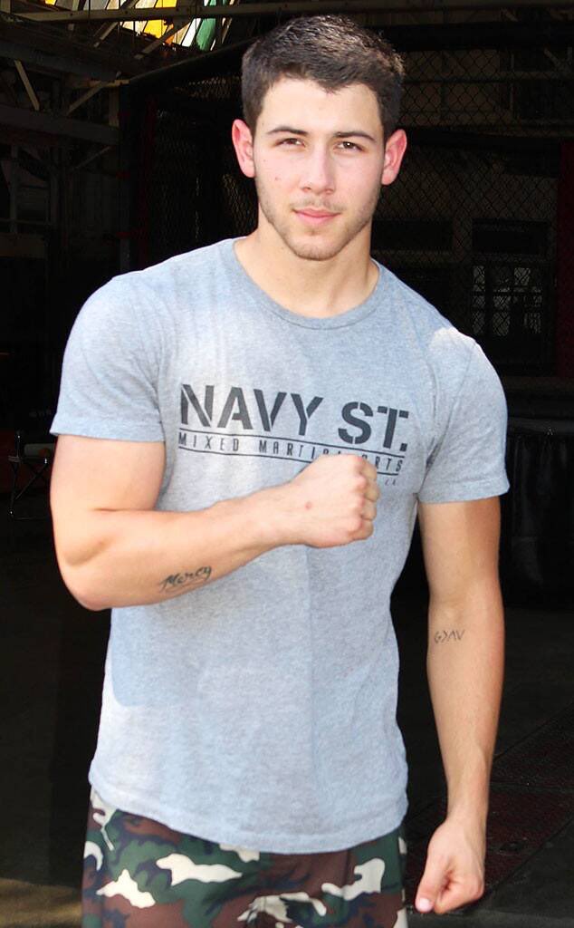 Nick Jonas in grey