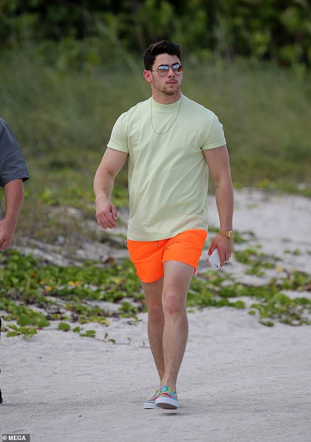 Nick Jonas in shorts