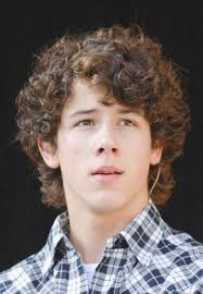 Nick Jonas with curls