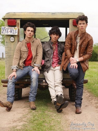 And finally,Nick Jonas with his brothers