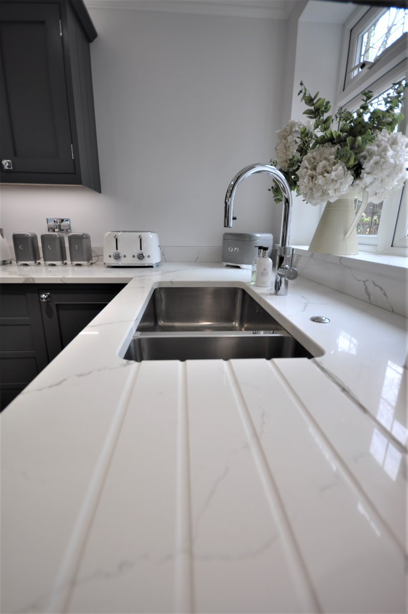 GraniteUKLtd's tweet photo. Circular Table in Caesarstone Raw Concrete against Calacatta Quartz Worktops. #Calacatta#CalacattaQuartz #Quartzworktops #QuartzworktopsEssex #caesarstoneuk #Loughton Call us on 01708 374 121 https://t.co/oFyumZHLqo