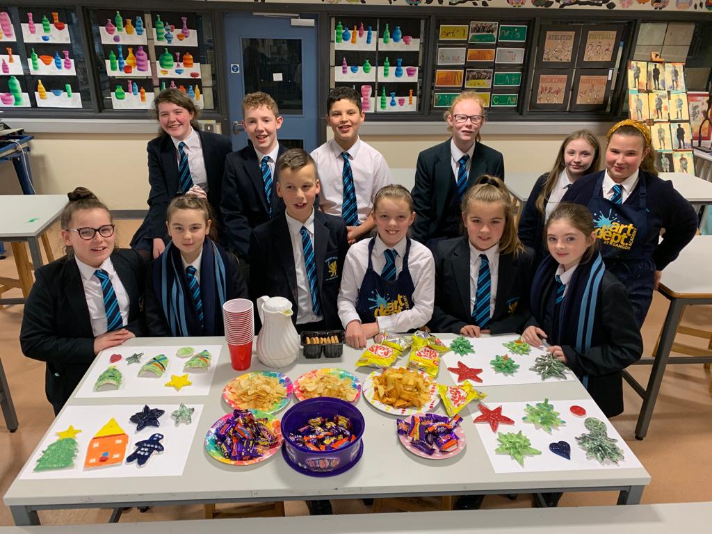 Year 8 Pottery Club celebrating a great term. Well done everyone!