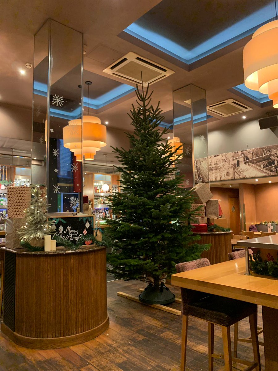 The <a href="/cambsxmastree/">Cambs xmas tree co. 🎄</a> now residing in #Baroosh #Cambridge is looking good between those mirrored pillars. Looking forward to seeing it decorated...