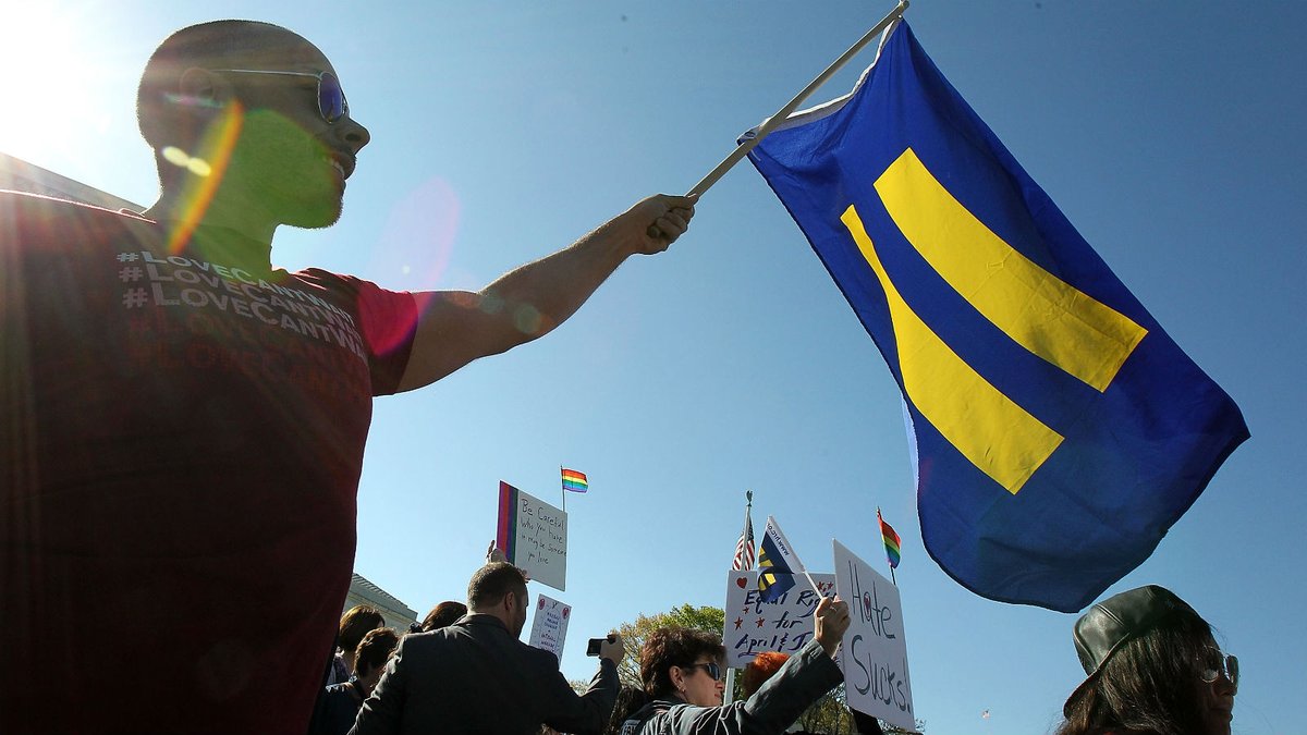 Person waving HRC flag