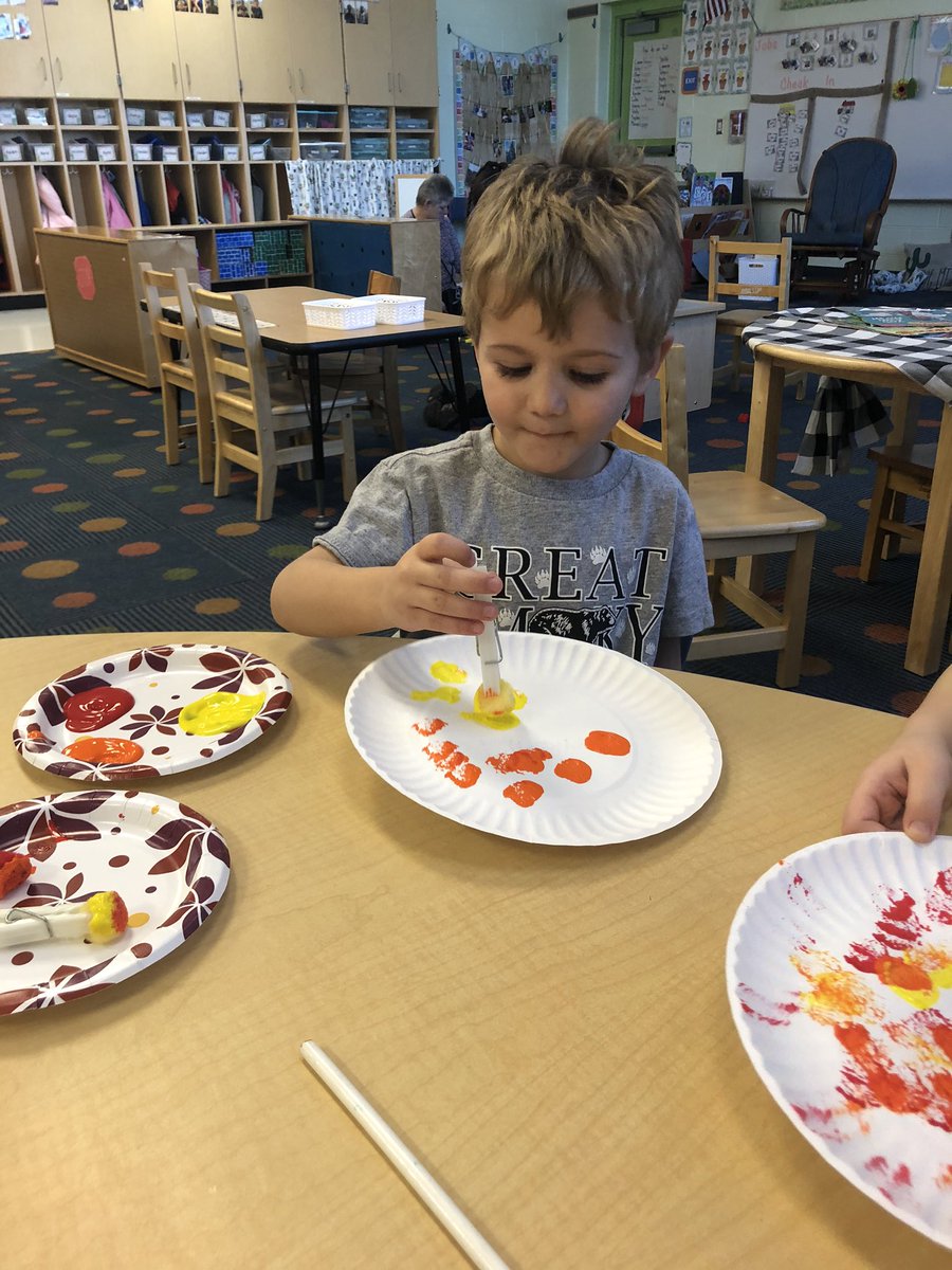 We wrapped up our Thanksgiving and turkey activities today with a Charlie Brown feast and fine motor turkeys! Each kiddo used their fine motor skills to take a Pom & clothes pin and dot paint onto a plate for feathers. #PowerOfPreschool @Hamilton_FW