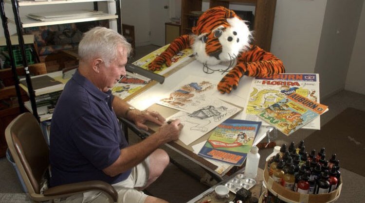 About the artist:Phil Neel was the artist behind the program art starting in 1960. Neel was the creator of Aubie, the Auburn mascot. For decades, Phil drew for Auburn, where two of his sons played football. He also drew for Clemson and other schools, his work is iconic.