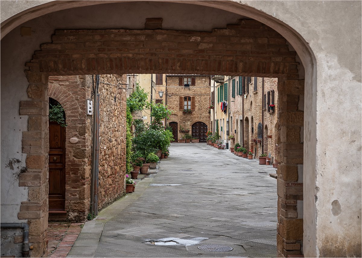 ...the many arches, supporting arches, vaults and gates serves to further create rooms out of what would otherwise be just corridors (the streets) while providing practical things like wall support, living spaces, etc.