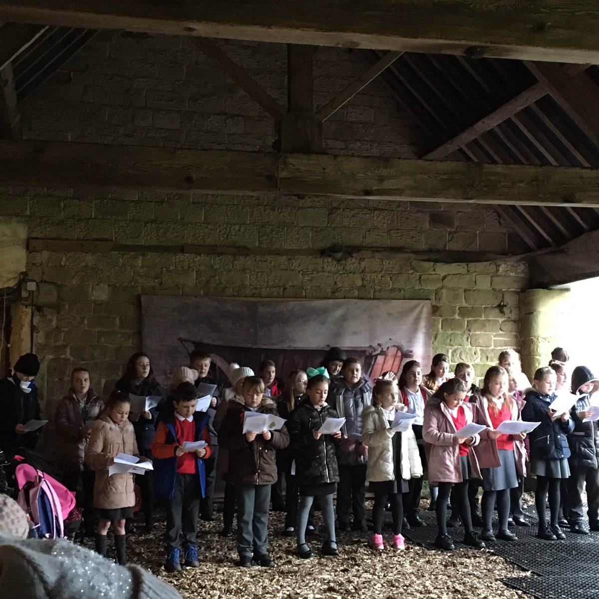 Is there anything more Christmassy than singing carols in a barn strewn with straw.

The choir at Hardwick Hall.

Thanks to Mrs Payne for the pictures.