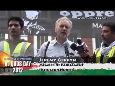 In 2012, Corbyn spoke at Al Quds Day (pictured joining with Hamas supporters, an organisation which called to "annihilate Jews" and said "the Holocaust is still to come upon the Jews") in support of Mahmoud Ahmadinejad's fight against the "Zionist black stain".