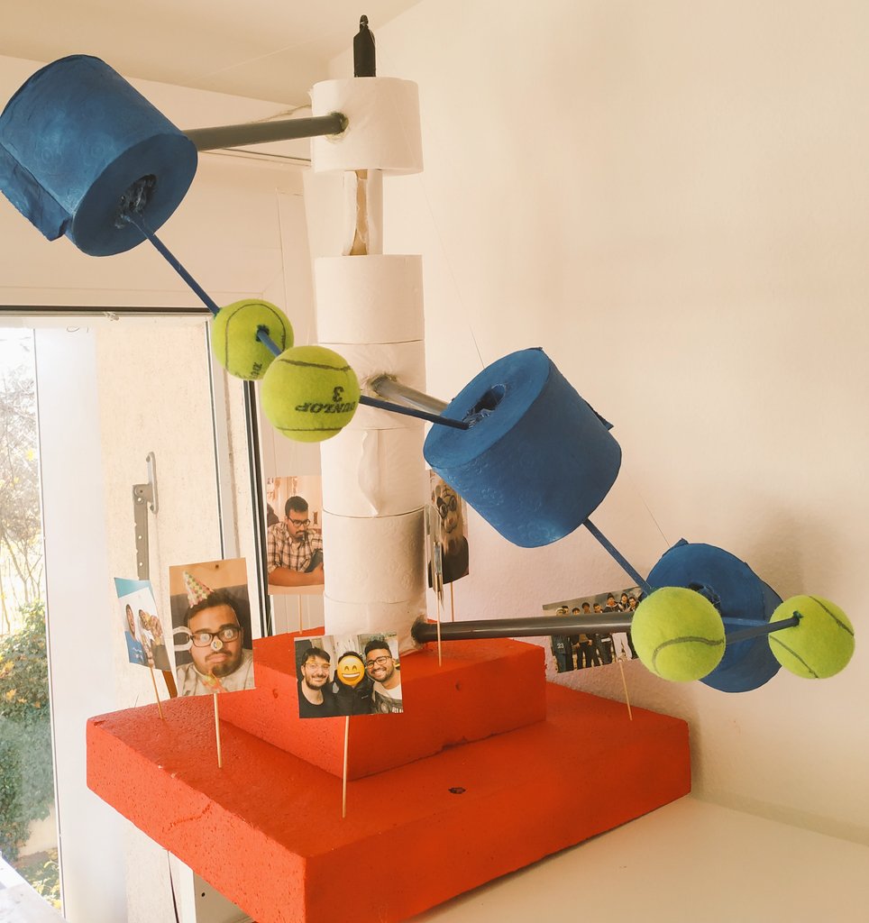 RMannancherry's tweet photo. My PhD hat 👨🏾‍🔬🎓 and the presents from my coworkers and supervisor is really tennis themed. ;)
@rogerfederer do you like my new logo on the bottle too? 
Many thanks to the chemistry department and to my collegues from the group for the gifts! :) https://t.co/jOi12ueXKZ
