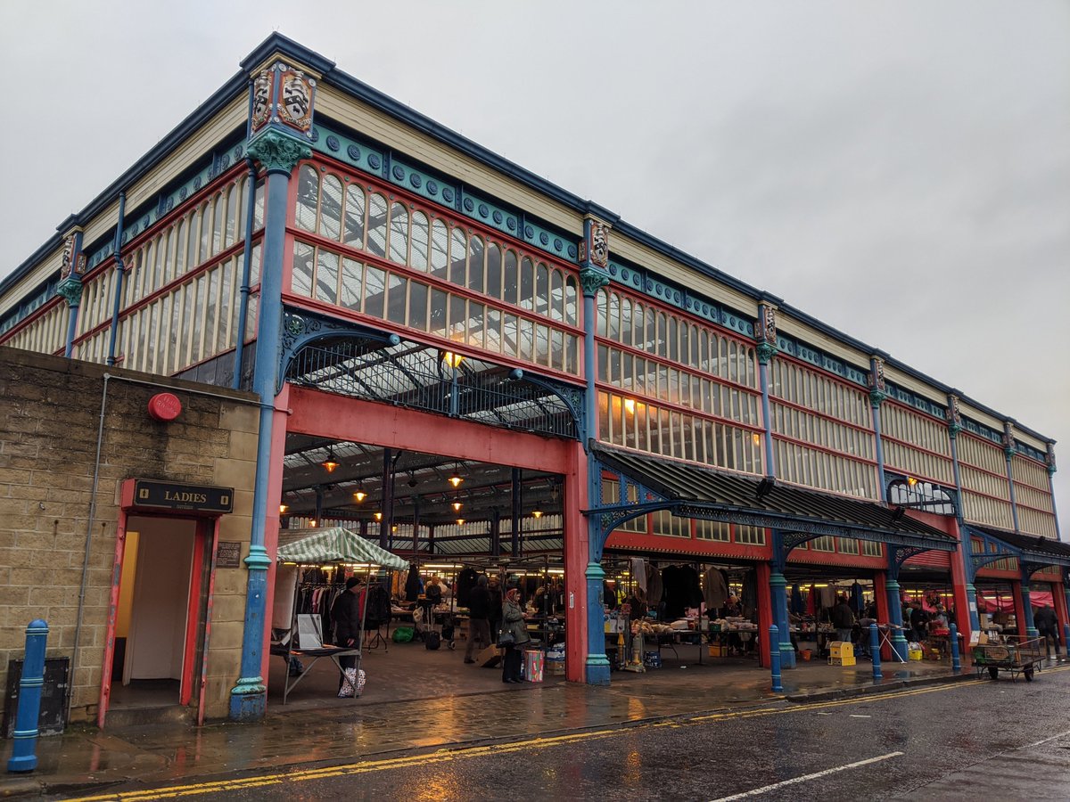 The market hall was designed by R S Drydale, Borough Surveyor, in 1887. The Borough coat of arms states 'God helps the diligent'. 4/7