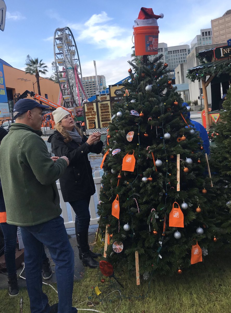 cjacoiv's tweet photo. A little rain couldn’t stop us from decorating the Home Depot tree at Christmas in the park. #pacnorthproud https://t.co/ycfy68xtis
