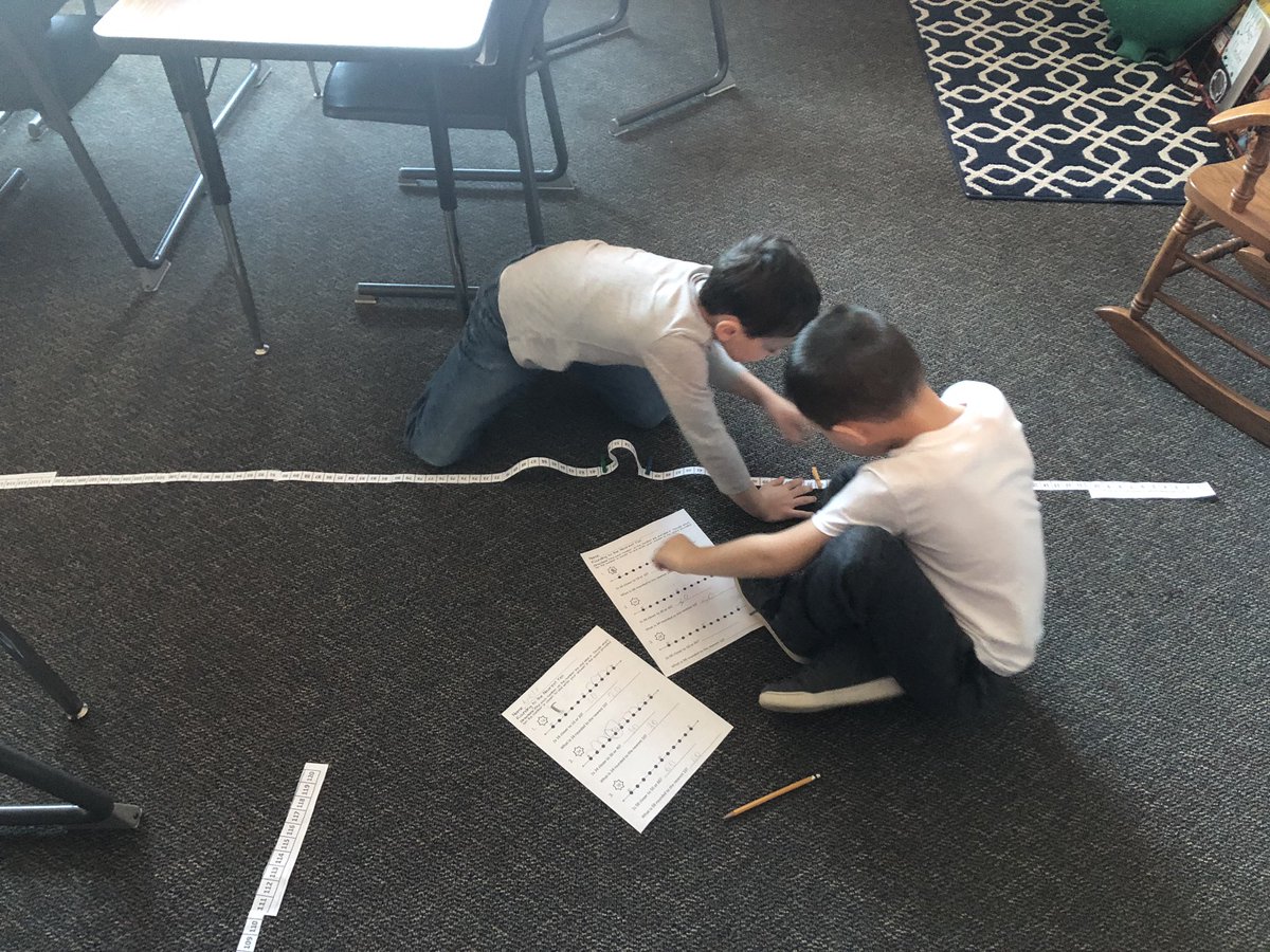 KWiseTeaches's tweet photo. We cut apart a 120 chart to see that it really IS a number line. Then, we tackled representing our rounding with colored clothespins! We love hands-on math, especially at the start of a unit! ✔️💪 https://t.co/VDF5xbgu1N