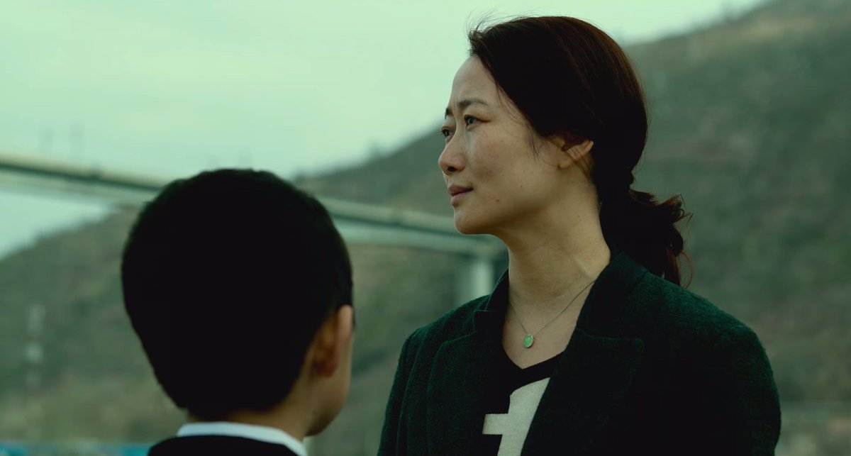 Zhao Tao in MOUNTAINS MAY DEPART (2015, dir. Jia Zhang-ke)Zhao Tao communicates so much when saying nothing in this story spanning three decades, charting the consequences of youthful decisions.Review:  https://seventh-row.com/2016/03/22/mountains-may-depart/