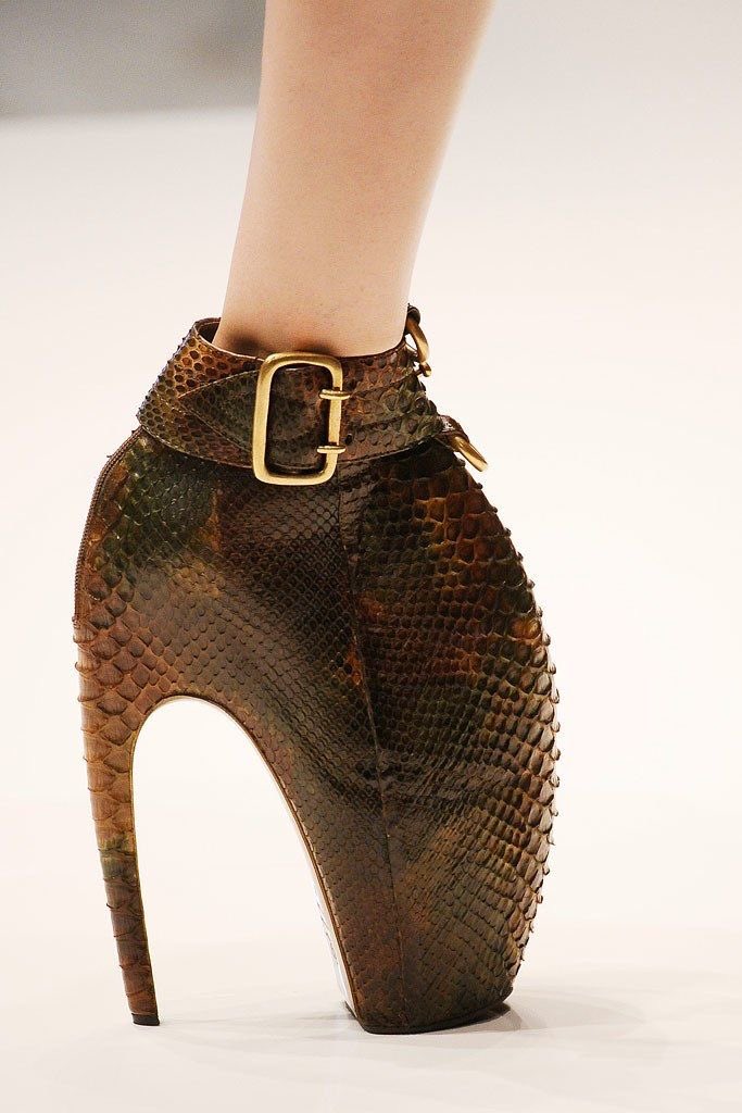 THE SHOES: We had three types of shoes in this collection, all 3D-printed contraptions. The most notable one is what were later called, "Armadillo Shoes", which sort of enveloped the models' legs like the gnarly mouth of a monster.