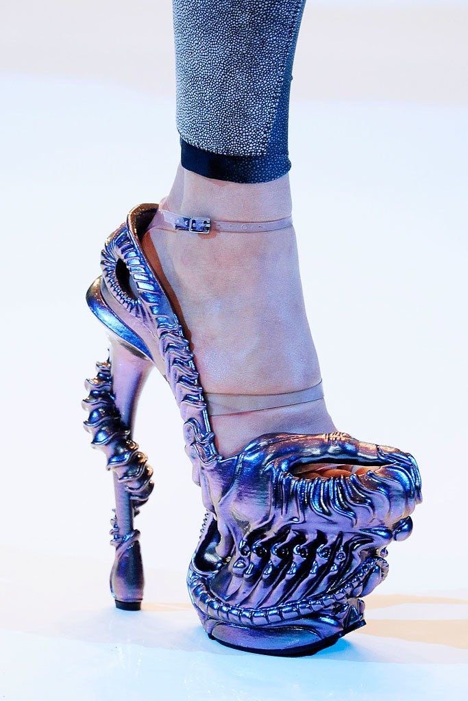 And finally, the "Alien Shoes", which appeared like a tentacle wrapped around the models' ankles. The design bares similarities to the predator in the film, Predator, however it was mostly inspired by the artwork of a special effects team member of the film, Alien, H.R. Giger.