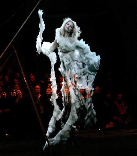 And lest we forget the FW '06 show, titled: Widows of Culloden, with the finale of Kate Moss appearing in the tirangular box as a hologram, floating whimsically and eerily like a melancholy ghost.