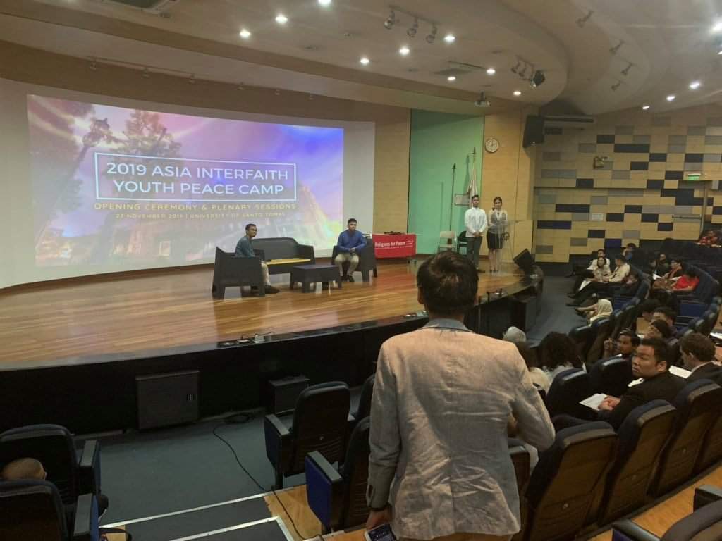 youth4mh's tweet photo. In the 2019 Asia Interfaith Youth Peace Camp, Dr. RJ Naguit, the National Chairperson of Y4MH, talked about fostering well-being by working for sustainability and integral development.
#RfPAPIYN #APIYNxUST #MoveForMH https://t.co/PKILEPRq1o