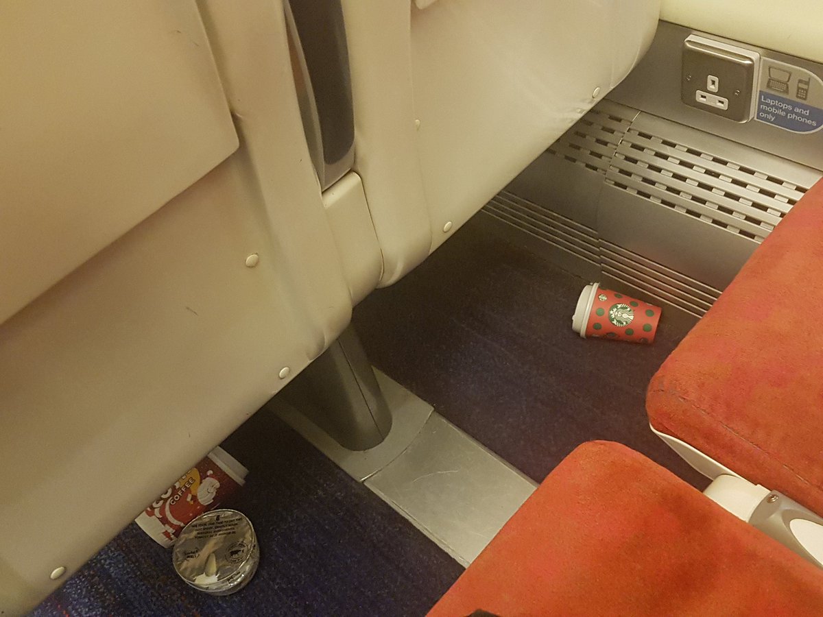 RichMcToffee's tweet photo. What is it about train travel that makes people assume they can leave their rubbish everywhere? So I have to clear up their mess before I sit down...just reinforces a littering culture @KeepBritainTidy @CrossCountryUK #lazy #litter #cupcharge https://t.co/IYmv2ur4q0