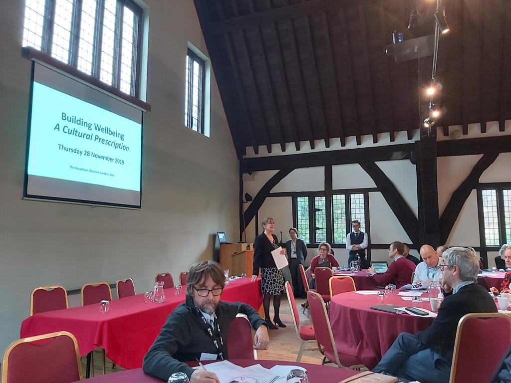 HealthyDaveC's tweet photo. Liz Denton and @ChangeMakerNo1 welcoming delegates to Building Wellbeing - A Cultral Prescription. How can we help spead the movement of #socialprescribing well lets start with museums @SimonSimply and York #hospitium hosting creative thinkers linking people to arts for wellbeing https://t.co/1Hltrk3fJx