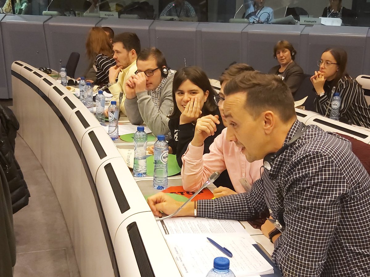 InclusionEurope's tweet photo. The waving paid off and support person Andres Lavado could ask his question: "We work for a small organisation called Aexpainba. We need people, staff and resources and we think that we shouldn't be left out of the conversation on the European Disability Strategy." #EDPD2019 https://t.co/nrVuU4KRFZ