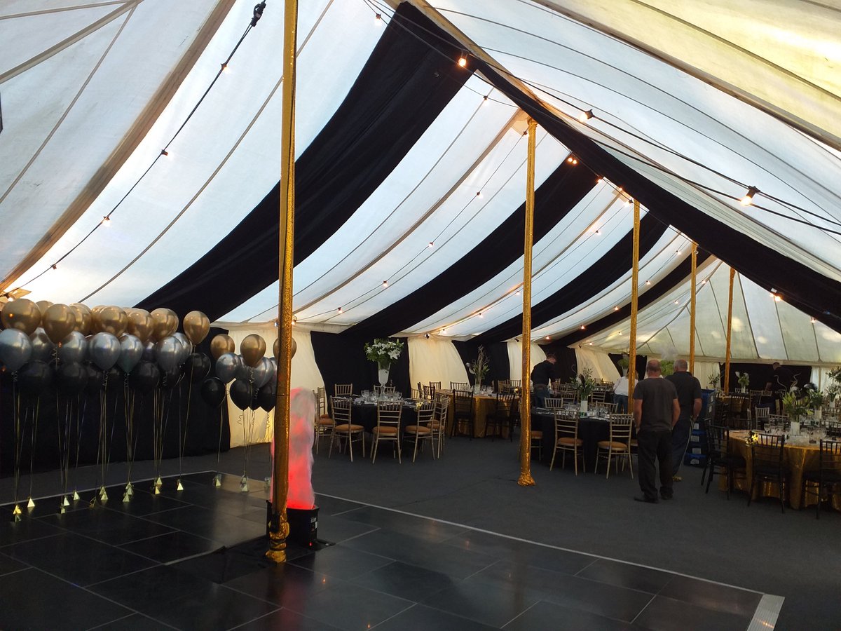 Gatsby Theme.. Our black Dancefloor, Festoons, Up lighting &amp; Silk flames in use for this sleek event. 😎😎