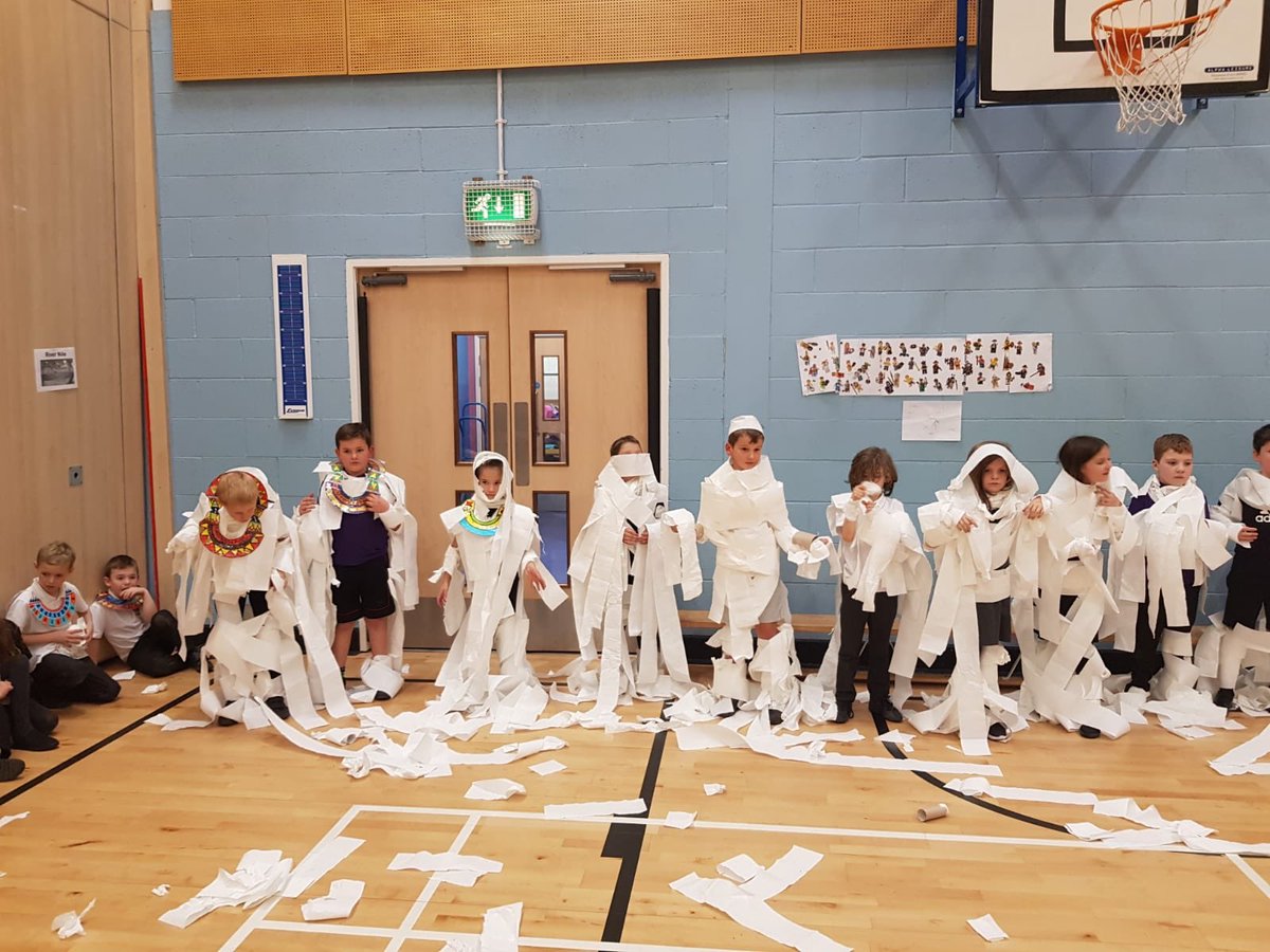 AnnanhillPS's tweet image. Part 1 -
Primary 4 had great fun at their Egyptian party today. Their favourite game was the mummy race! #topictime #funinp4