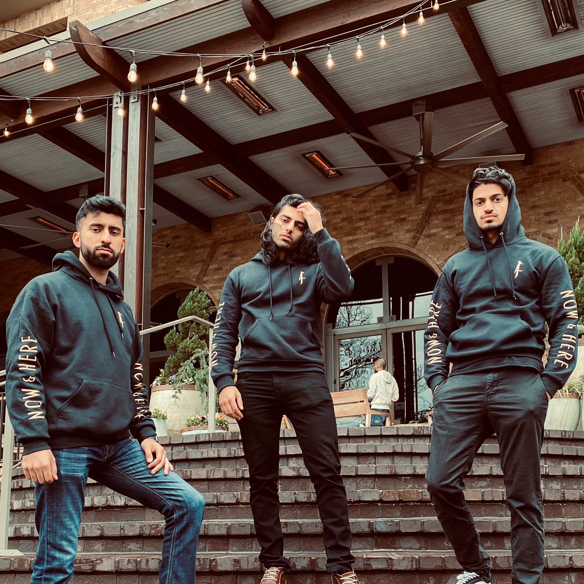 AlifTheory's tweet photo. No delays on the hustle. “Now &amp; Here” @aliftheory hoodies back for a limited time this holiday. Get yours before they’re gone! https://t.co/qPxjG8Ejfw https://t.co/3r9BnUTngP