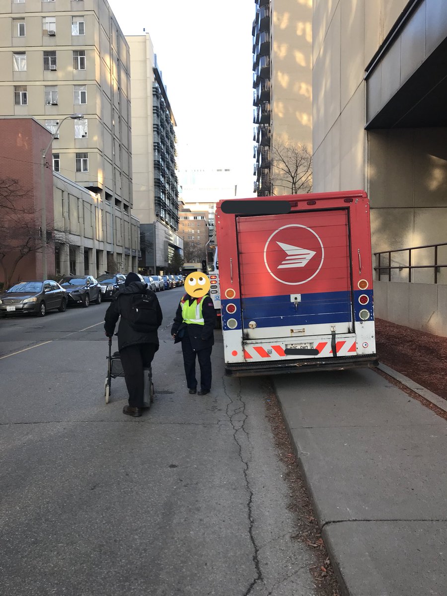 ParkingTPS's tweet photo. This @canadapostcorp truck has parked fully obstructing the sidewalk forcing a disable man with a walker to pass on the roadway #NotSafe #TagAndTow ^sk https://t.co/hvTrUxDhxt